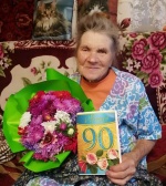 Романовский получатель социальных услуг отмечает 90-летний юбилей.