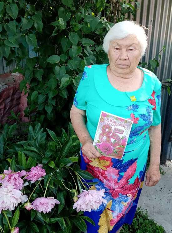 Романовский получатель социальных услуг отмечает 85-летний юбилей.